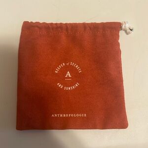 Brick red Anthropologie jewelry dust bag